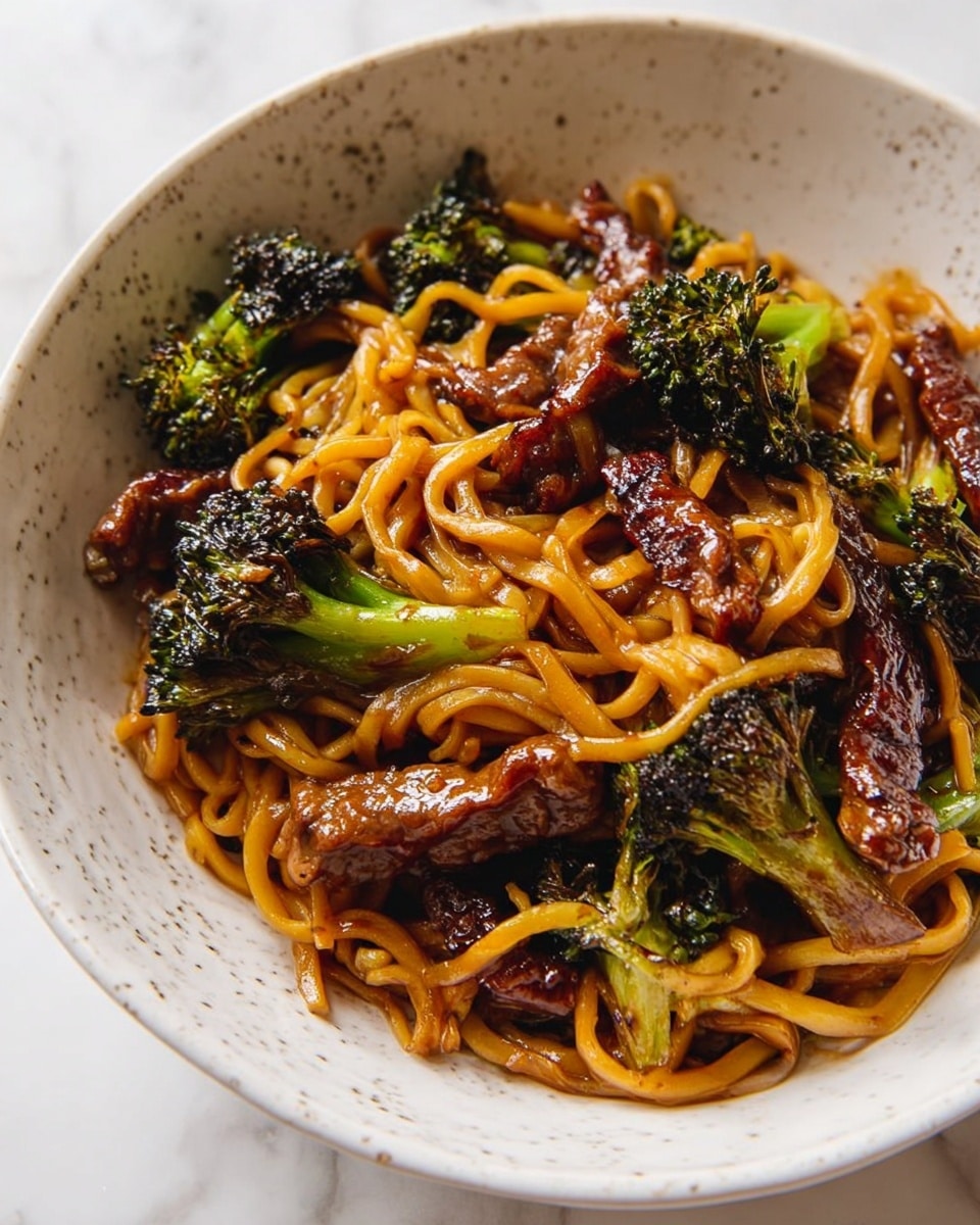 The image shows two side-by-side photos of thin strips of beef on a white marbled surface covered with brown parchment paper on a baking tray; on the left side, the raw beef strips are pink and wet with some white flour and oil scattered on the paper, while on the right side, the same strips are cooked to a dark brown color with a slight shine from the oil, some browned bits and oil marks are visible on the paper, demonstrating the transformation from raw to cooked meat photo taken with an iphone --ar 4:5 --v 7