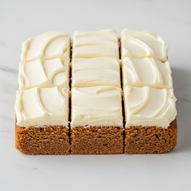 A square cake is cut into nine equal pieces and placed on a white marbled surface. The cake has two layers: the bottom layer is a thick, soft, light brown cake with a slightly rough texture, and the top layer is a smooth, creamy white frosting with subtle swirls and waves, covering the entire cake surface evenly. The edges of the frosting show some gentle, curved strokes, adding a delicate texture contrast to the soft cake below. Photo taken with an iphone --ar 4:5 --v 7