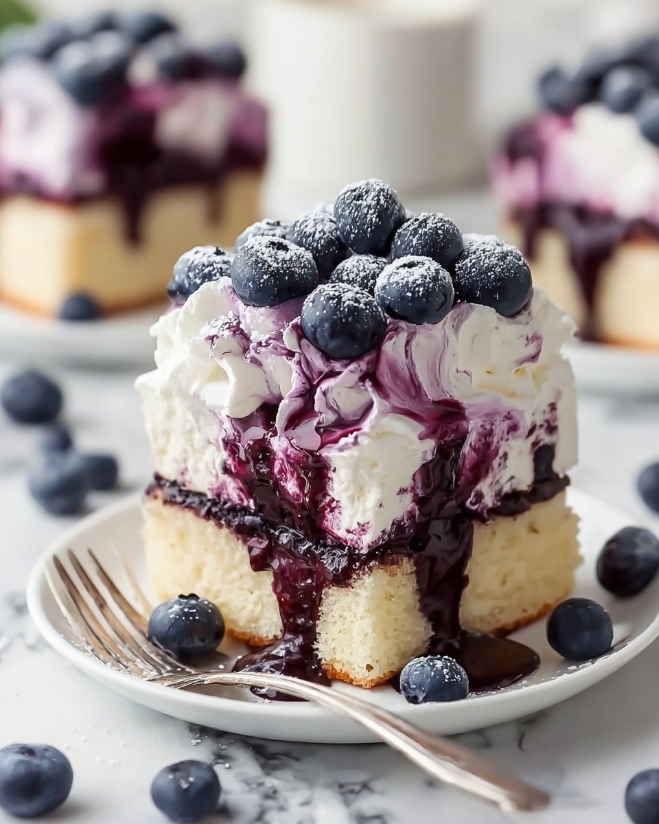 The image shows a dessert with three layers: the bottom and middle layers are soft, light yellow cake squares. Between these cake layers, there is a dark purple blueberry sauce that drips slightly down the sides. On top of the cake layers is a thick, fluffy layer of white cream mixed with streaks of the blueberry sauce, creating a marbled purple effect. The dessert is topped with several whole fresh blueberries dusted lightly with powdered sugar. The dessert sits on a white plate with blueberry sauce spreading out on the plate around it, and a metal fork rests beside the dessert. The background has a soft focus showing more of the same dessert and small glass jars of sauce, all on a white marbled surface. Photo taken with an iphone --ar 4:5 --v 7