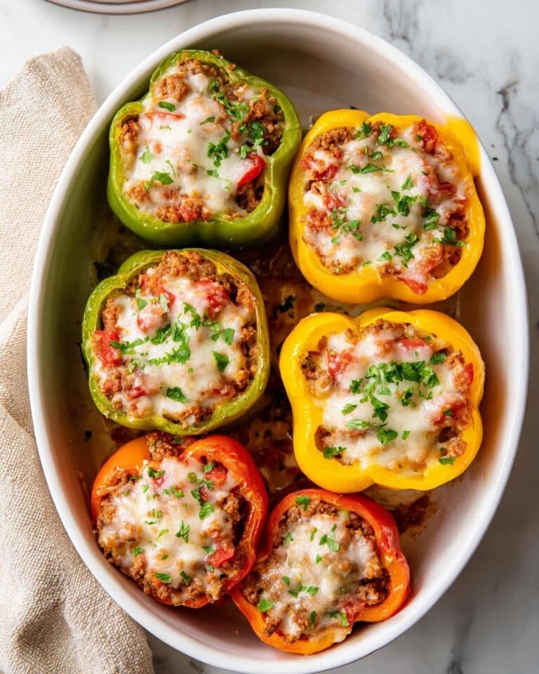Stuffed Bell Peppers with Ground Beef, Rice, and Melty Cheese Recipe