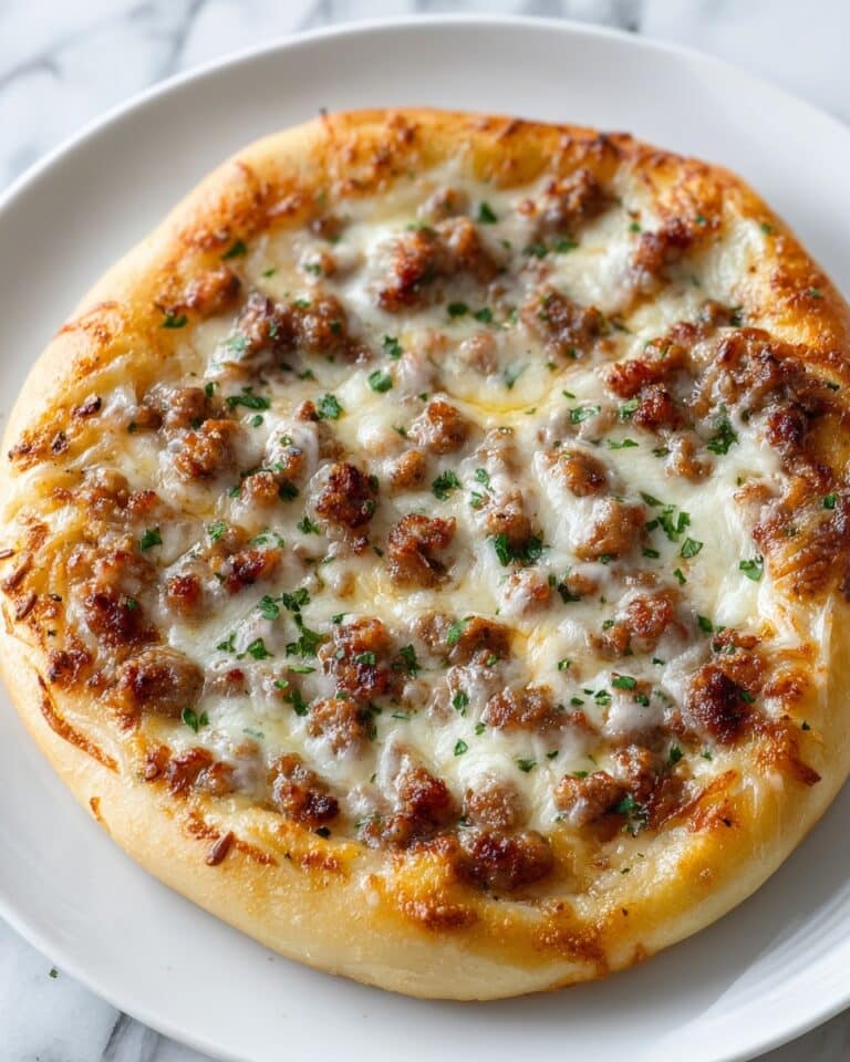 Indulgent Sausage Gravy Crescent Roll Breakfast Pizza Delight Recipe