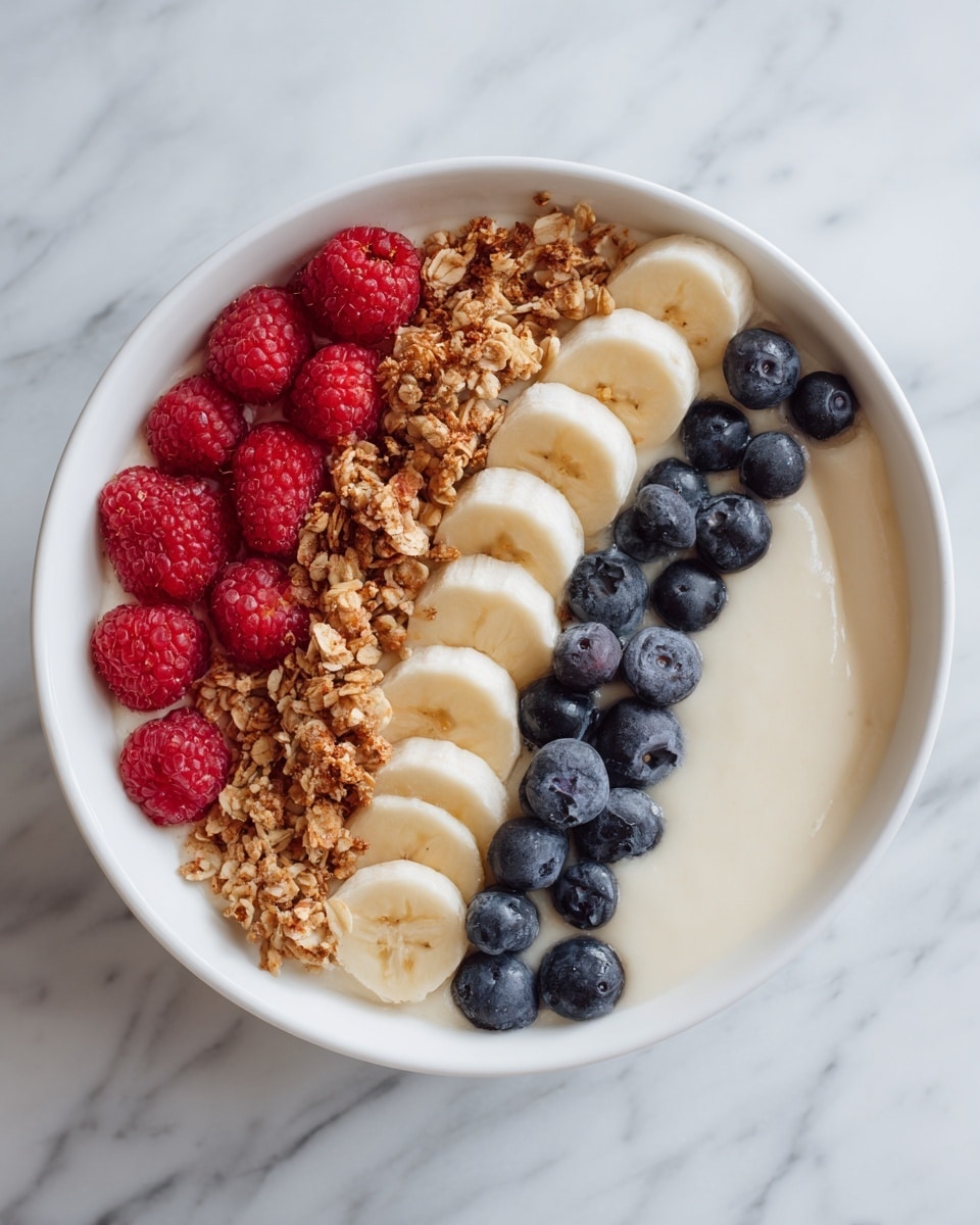 A white bowl filled with creamy, light gray porridge topped with three neat rows of fresh fruit and nuts: on the left, dark blue blueberries with a smooth texture; in the middle, bright red raspberries with a bumpy surface; and on the right, creamy yellow banana slices with a soft texture, arranged in a curved line. Between the raspberries and bananas, there is a strip of chopped brown nuts adding a rough texture. A woman's hand holds a small wooden spoon on the right side of the bowl. The bowl is placed on a white marbled surface. photo taken with an iphone --ar 4:5 --v 7