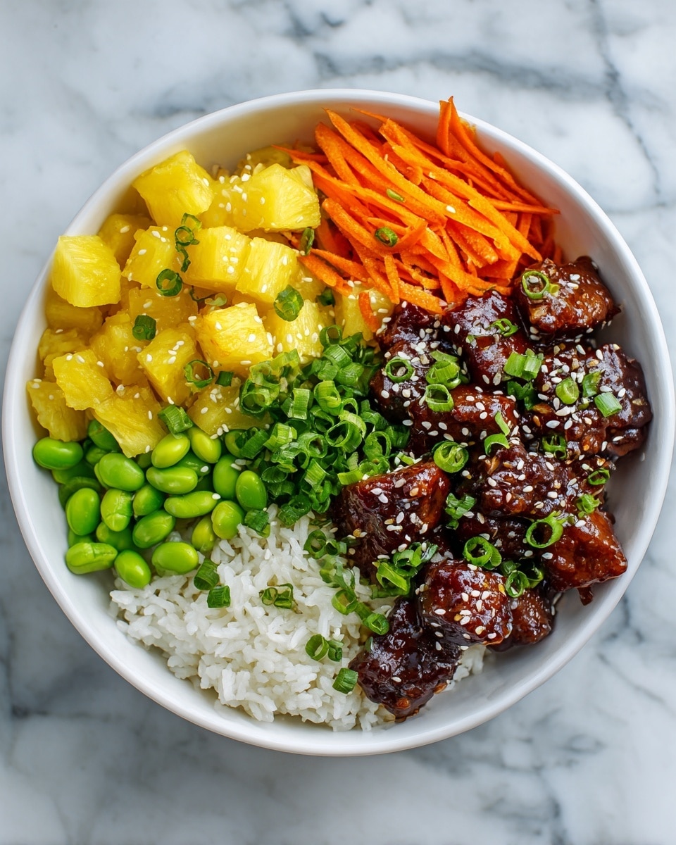 The image shows a white bowl filled with four clear sections on top of white rice. One section has small bright green edamame beans, another has golden yellow pineapple chunks, and a third section shows thin shredded orange carrots. The last section is filled with small brown glazed pieces of cooked chicken topped with white sesame seeds and chopped green onions. The bowl sits on a white marble surface. photo taken with an iphone --ar 4:5 --v 7