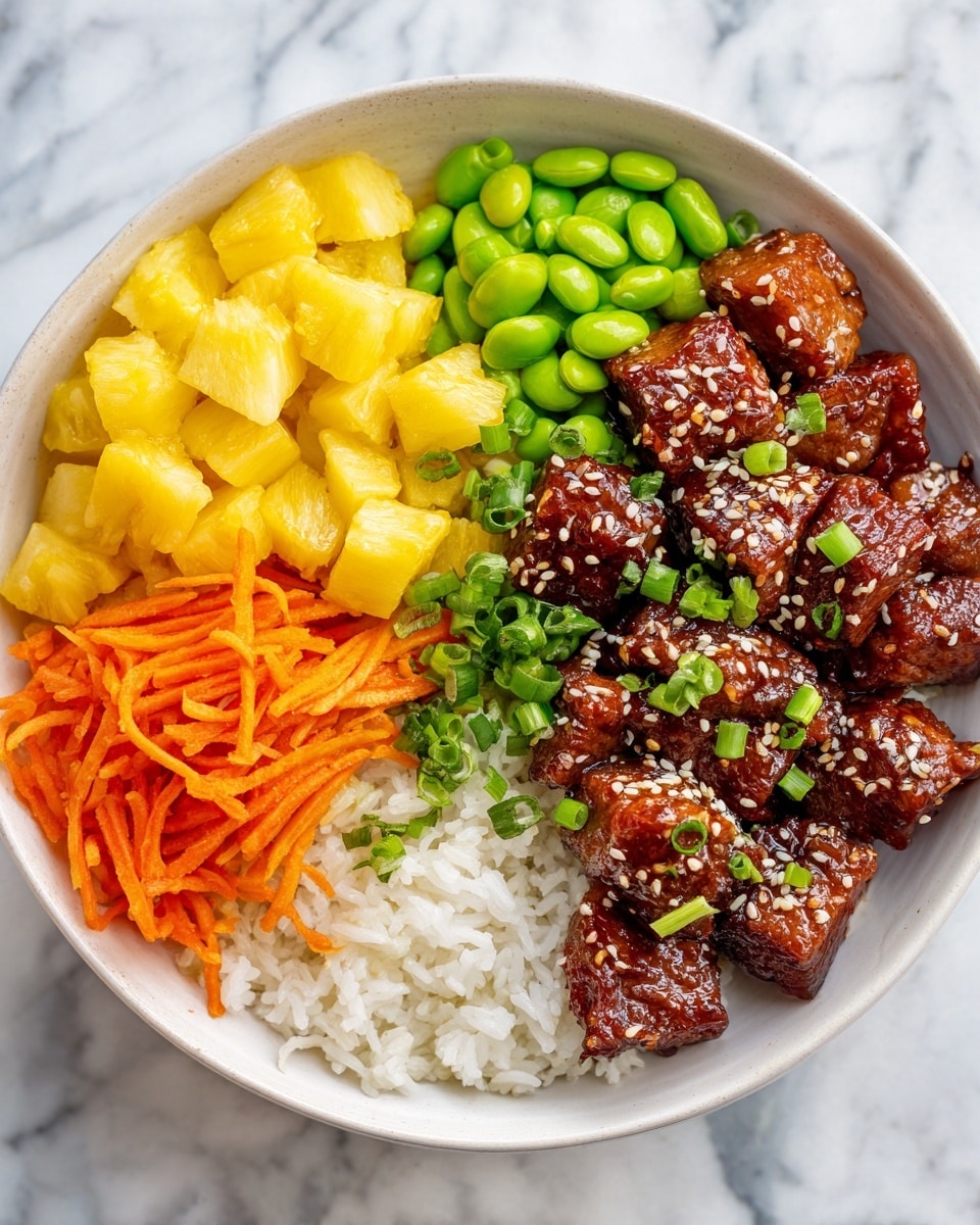 The image shows a white bowl filled with four main sections on a base of white rice. One section has bright yellow pineapple chunks, next to them there are small green edamame beans, followed by thin orange shredded carrots, and lastly a portion of glossy, dark brown glazed pieces of meat topped with white sesame seeds and chopped green onions. The colors are vibrant and each section is neatly placed side by side. The bowl is on a white marbled surface. Photo taken with an iphone --ar 4:5 --v 7